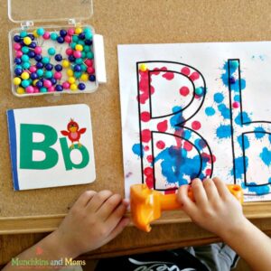 push pins and a corkboard to help learn the alphabet