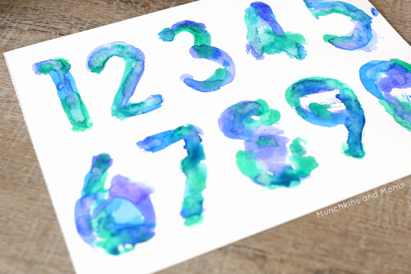 Make beautiful watercolors art with a foam numbers puzzle! Preschoolers and toddlers do great with this!