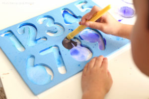 Make beautiful watercolors art with a foam numbers puzzle! Preschoolers and toddlers do great with this!