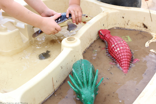 Dinosaur Mud Play- a great preschool sensory activity for our dinosaur theme! 