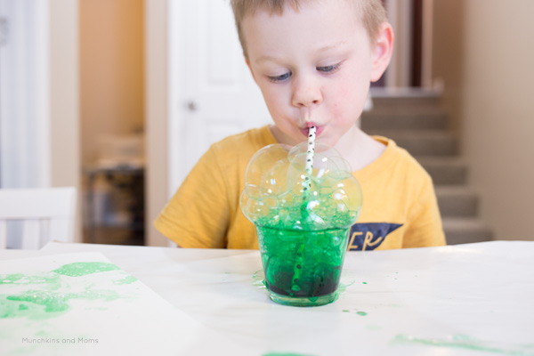 Kids blow milk bubbles in Stanley Cup